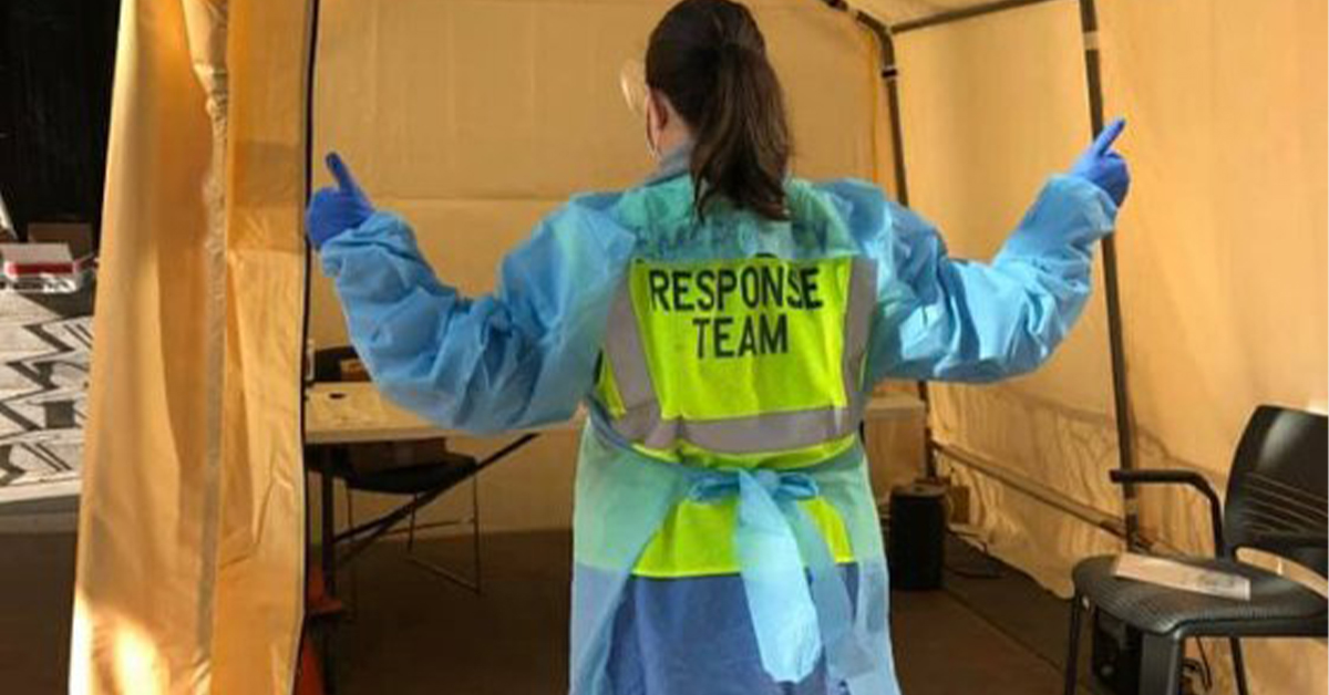 Woman standing in response team gear at hospitals hiring for corona covid-19 virus. MEDIjobs